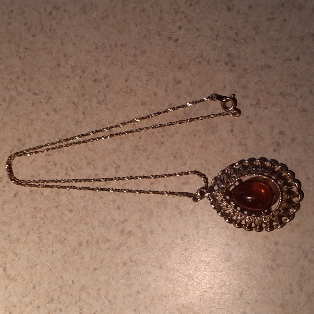 Amber colored pendant necklace